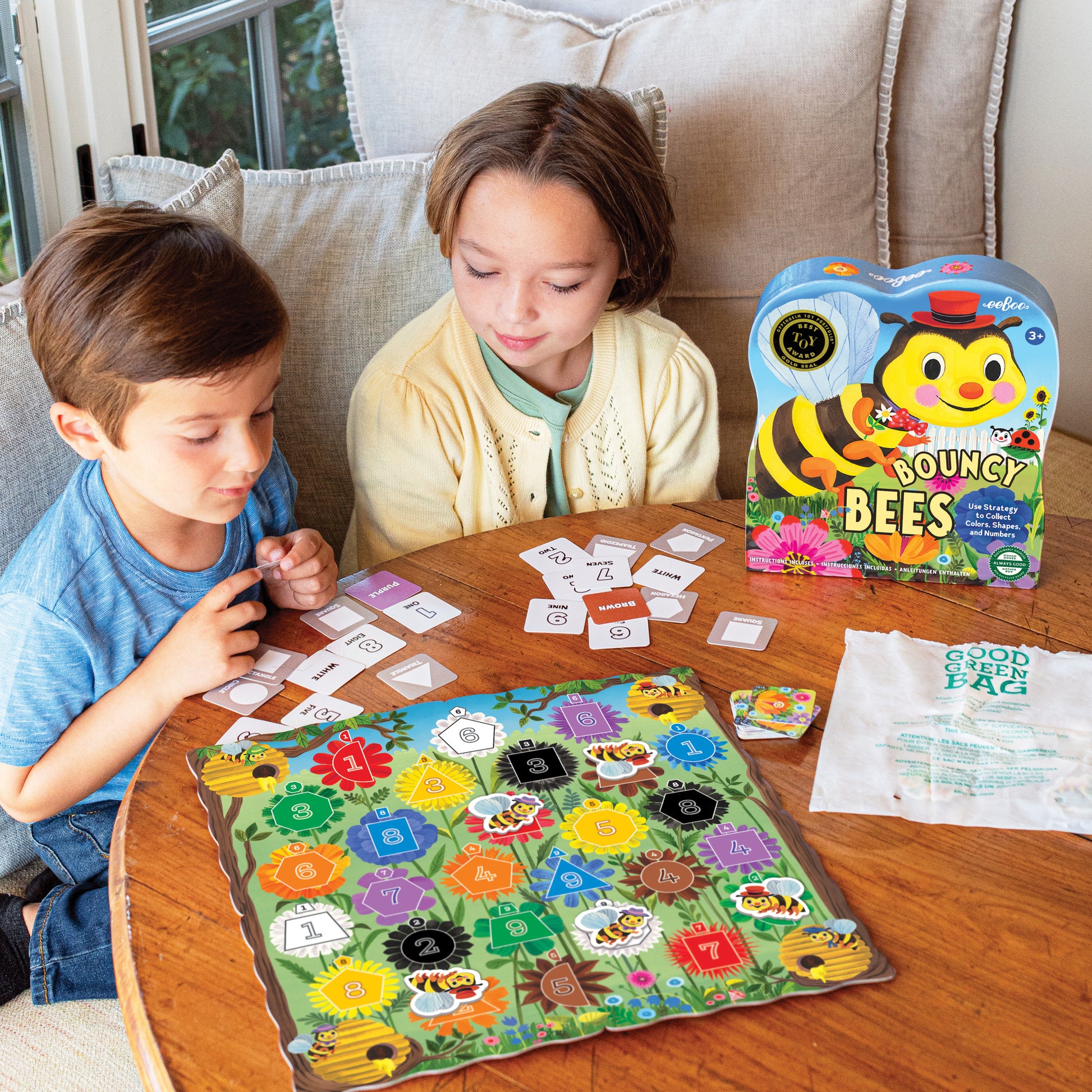Bouncy Bees educational game with colorful flower board, number tiles, and bee playing pieces