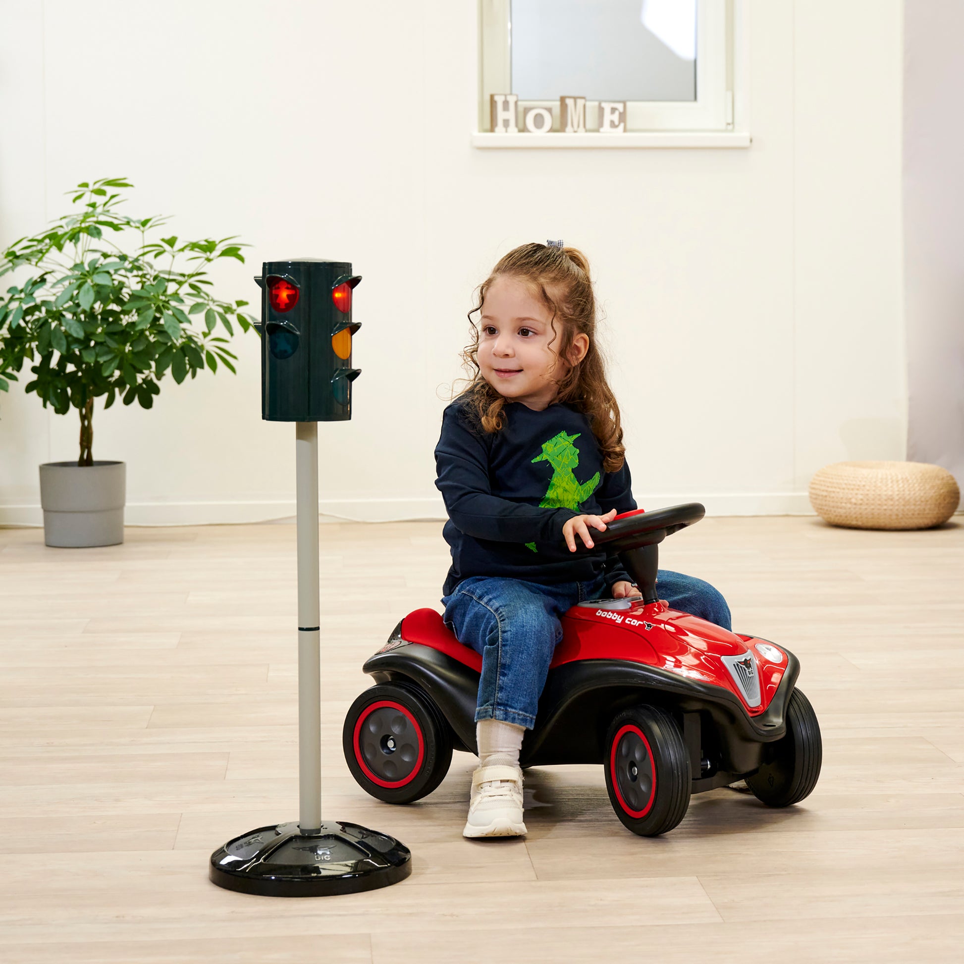 BIG Traffic Stoplight toy with red and yellow lights, child on red ride-on car