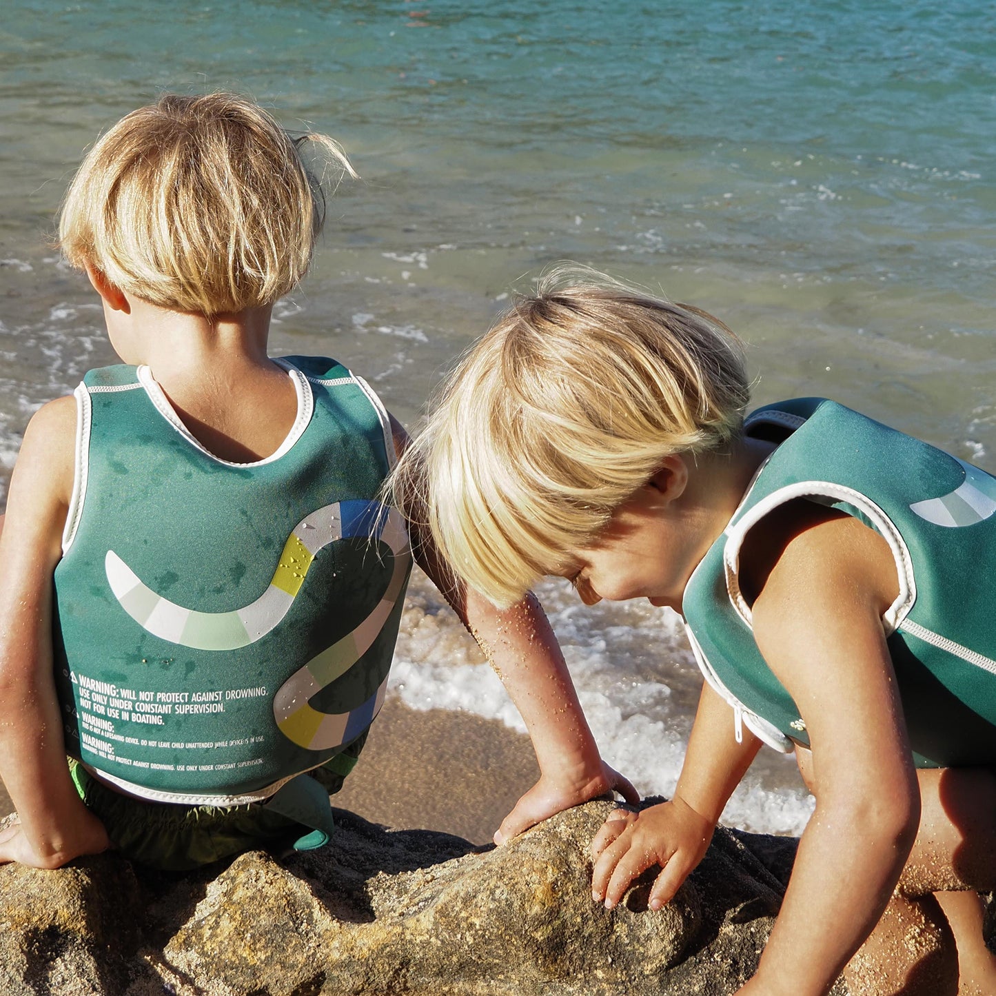 Sunnylife Into The Jungle Float Vest neoprene swim aid in teal with white trim