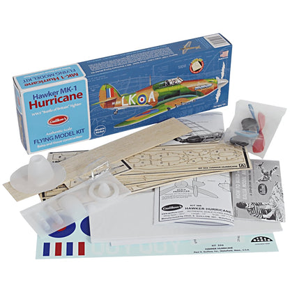 Guillow's Hawker Hurricane balsa wood model airplane kit with green and yellow aircraft and assembly parts