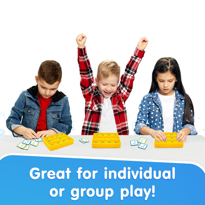 Pop Bingo Math game with three children playing, yellow bingo cards, and math tiles for individual or group play