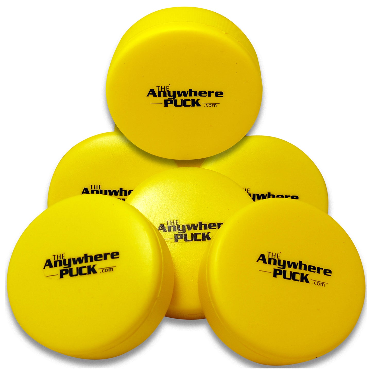 Six yellow foam hockey pucks branded with The Anywhere Puck logo, stacked in a pyramid arrangement