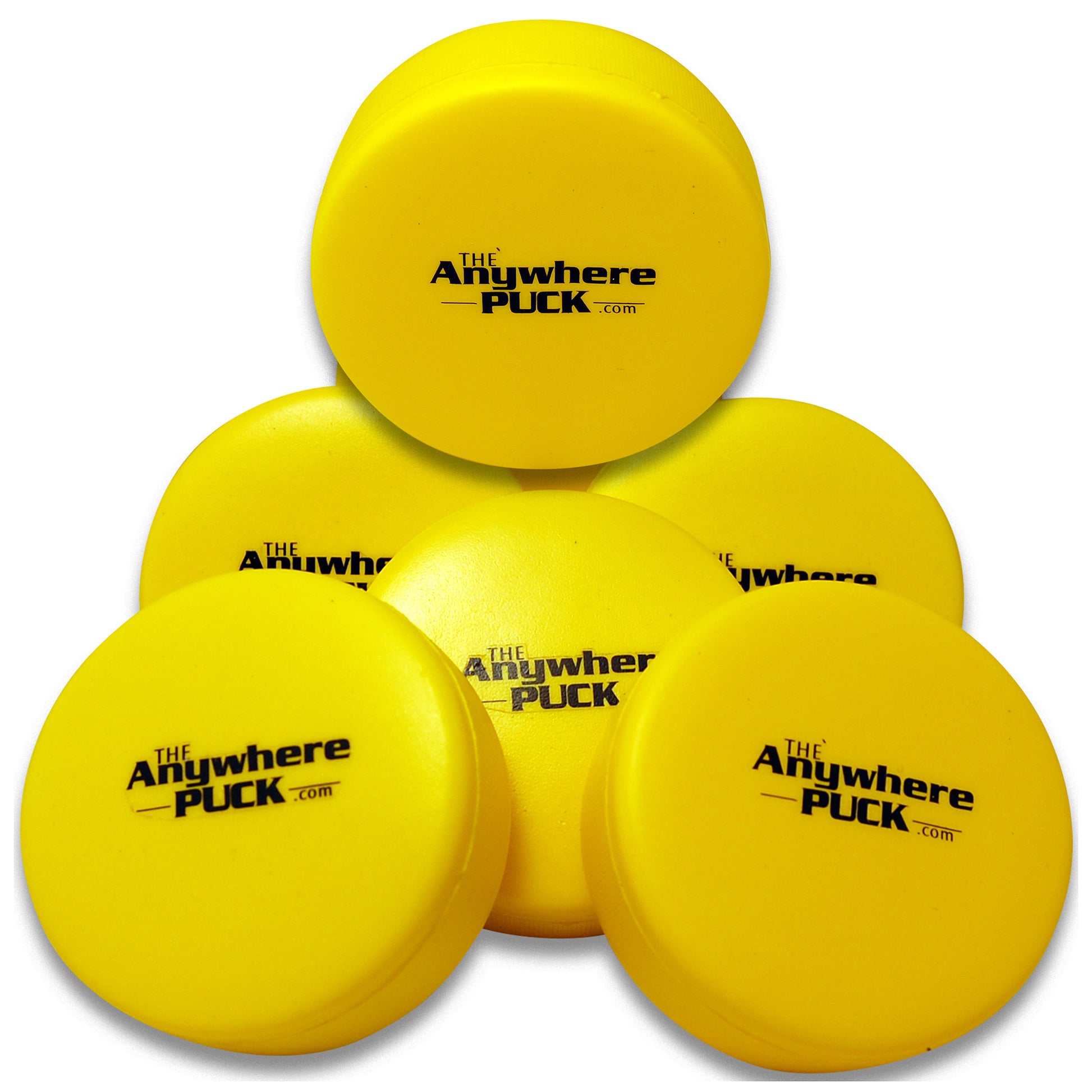 Six yellow foam hockey pucks branded with The Anywhere Puck logo, stacked in a pyramid arrangement