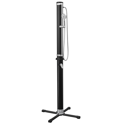 Black outdoor solar shower with tall cylindrical tank, chrome showerhead, handheld spray wand, and cross-base stand