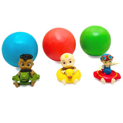 Three colorful soap ball kits with character figurines: blue ball with child figure holding green turtle, red ball with bald character on yellow duck, green bal