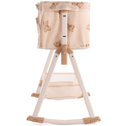 Roma Teddy Bedside Crib with beige fabric, teddy bear pattern, and wooden legs