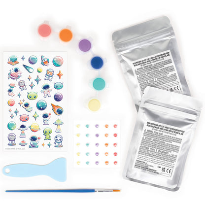 Rock Dough Cosmic Creations craft set with colorful dough, space stickers, and tools