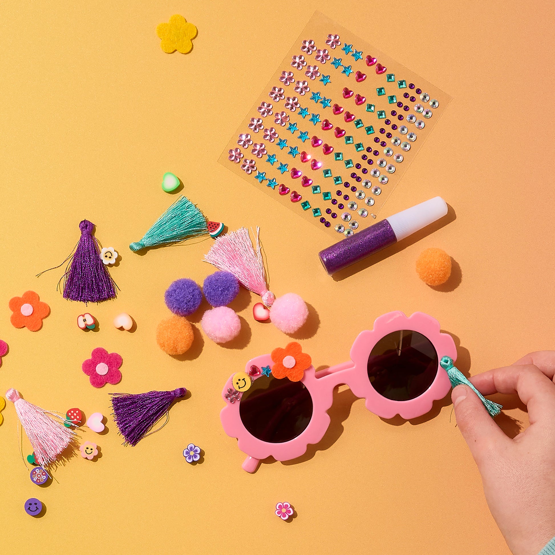 JOS Decorate Your Own Sunglasses Flower craft kit with pink flower-shaped frames and colorful gem stickers