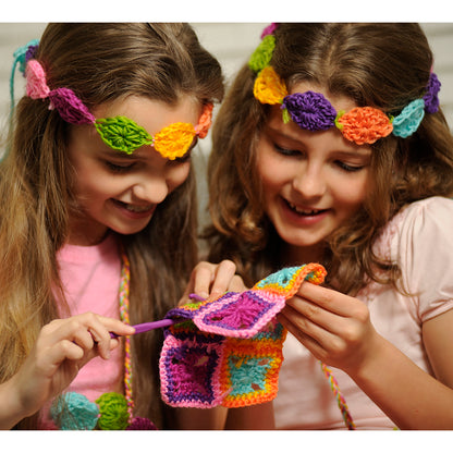 Easy-To-Do Crochet kit with colorful crocheted flowers, leaves, and accessories in pink, purple, orange, and green