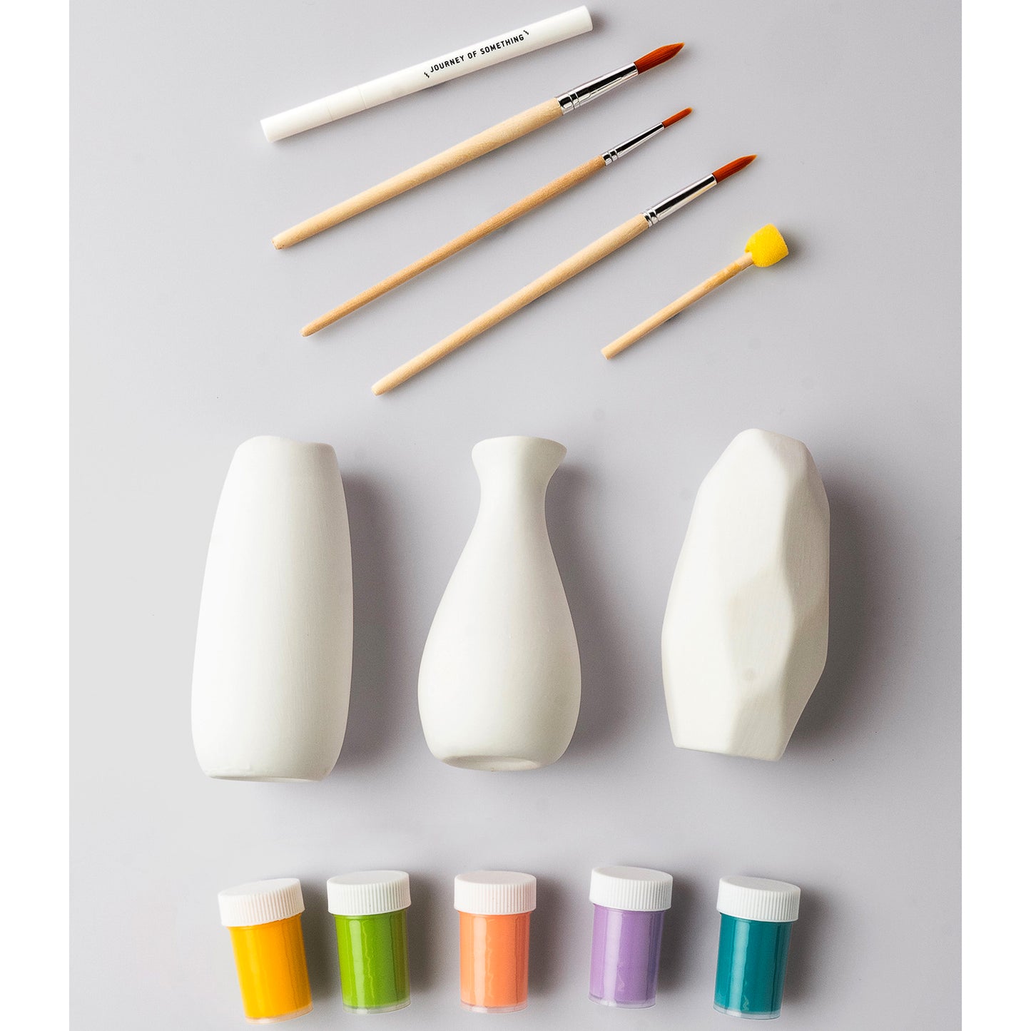 JOS Paint Your Own Vases craft kit with three white ceramic vases, brushes, and five paint colors