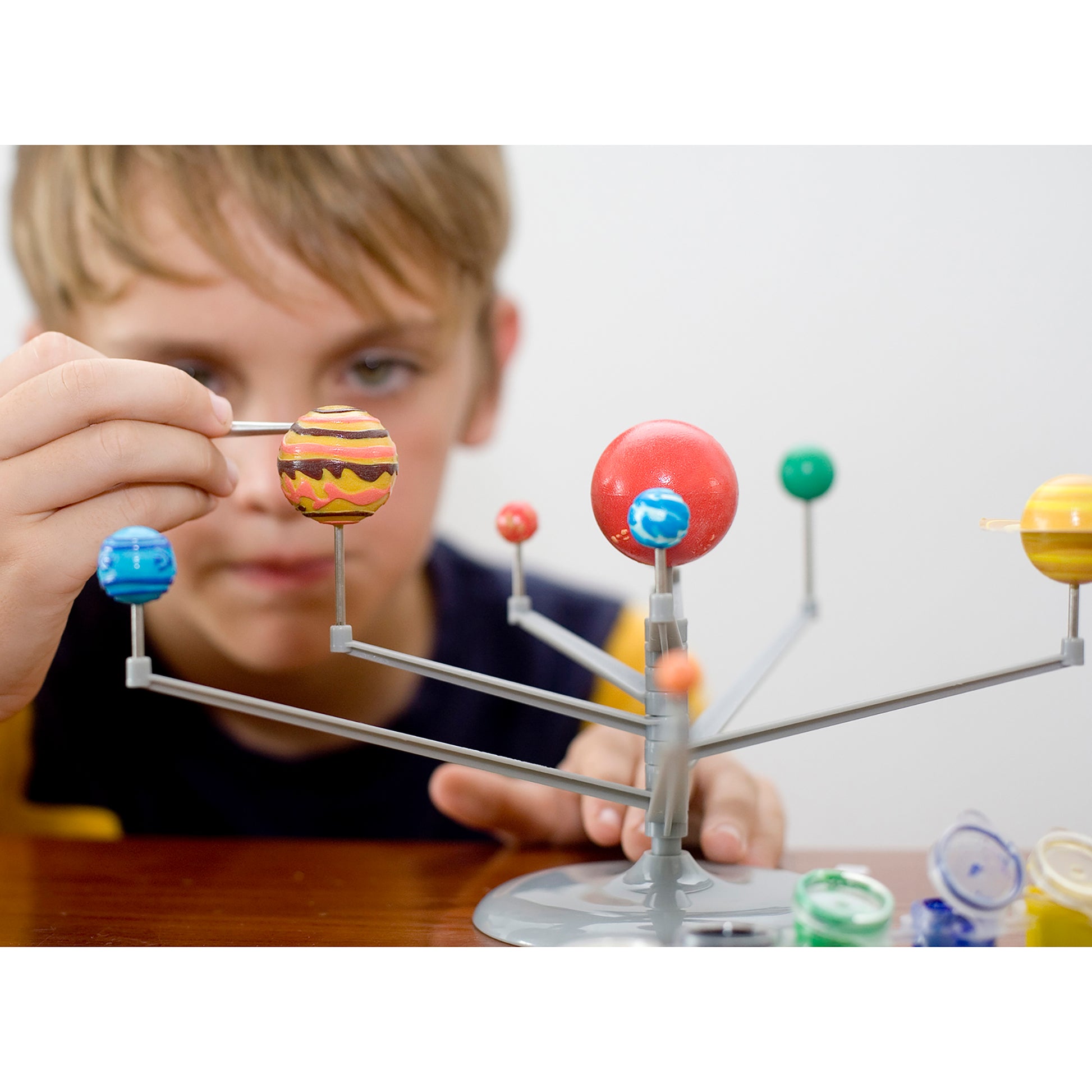 KidzLabs Solar System Planetarium with colorful planet spheres on orbital arms