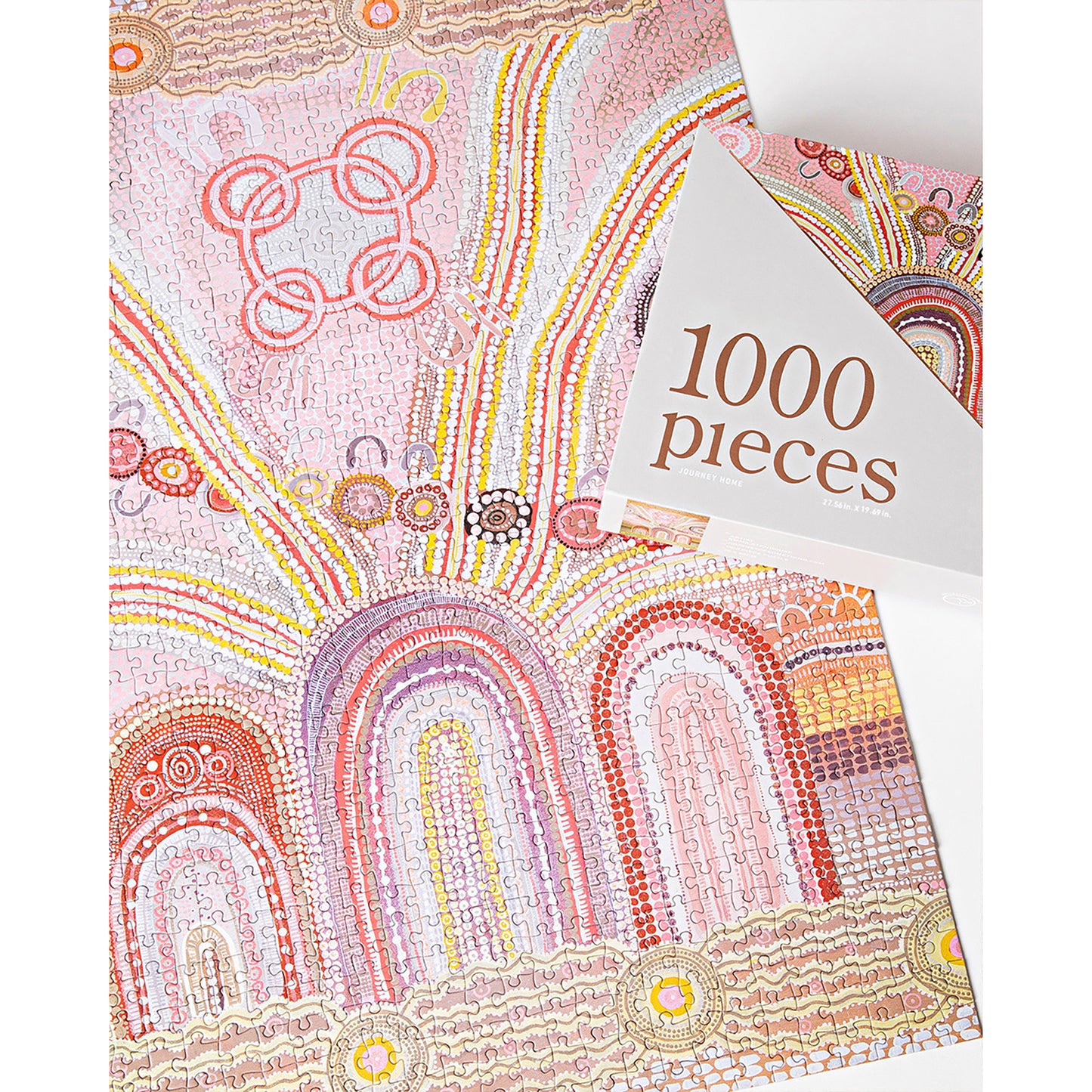 JOS Journey Home 1000 Piece Puzzle with pink, red, and yellow Aboriginal dot painting design