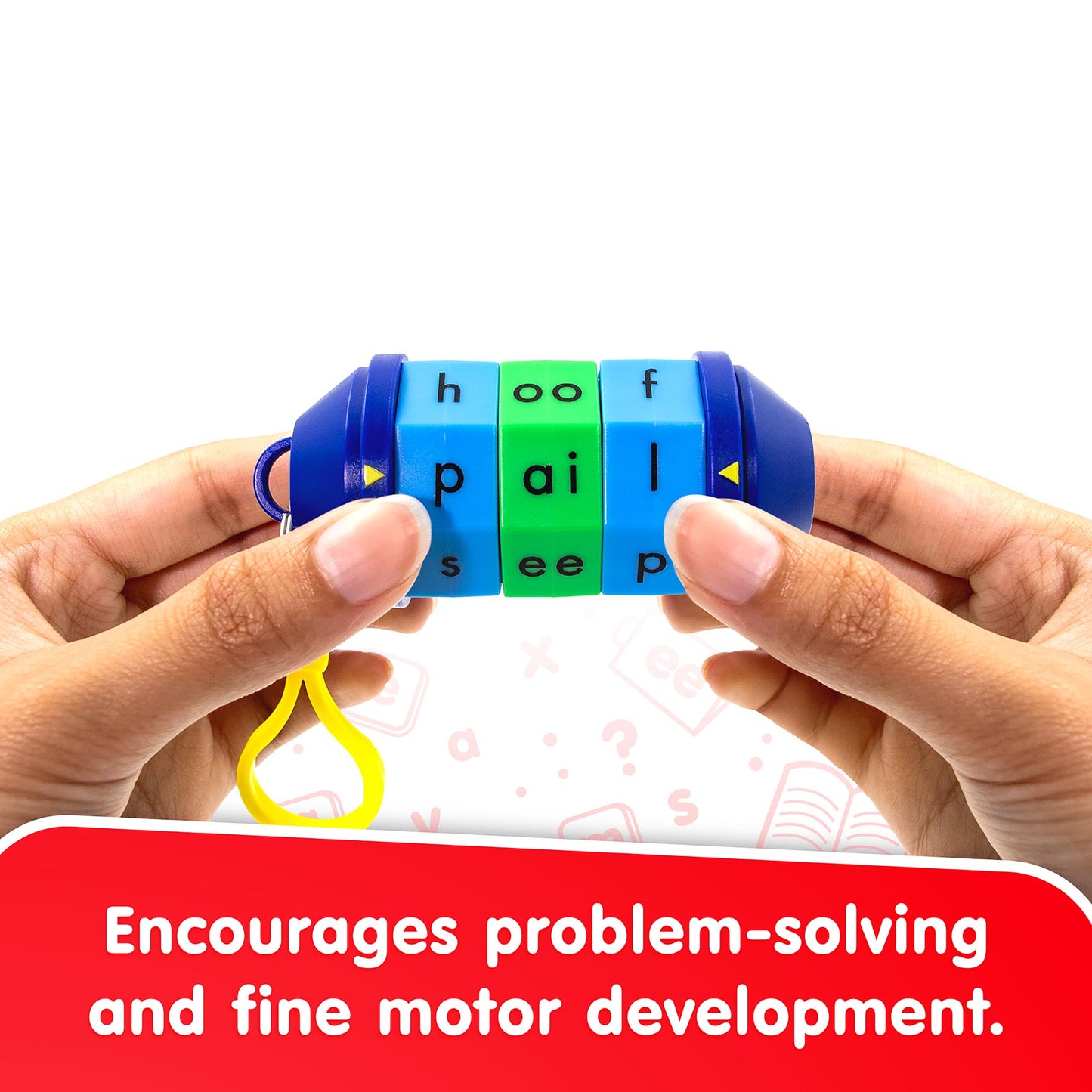 Junior Learning Word Tumbler phonics toy with blue and green letter cubes being held in hands