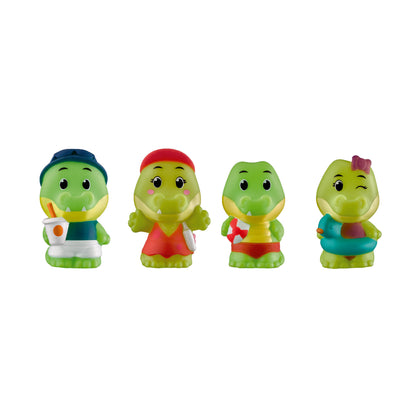 Four green crocodile figurines with different colored outfits and accessories, displayed in a row on a plain white background