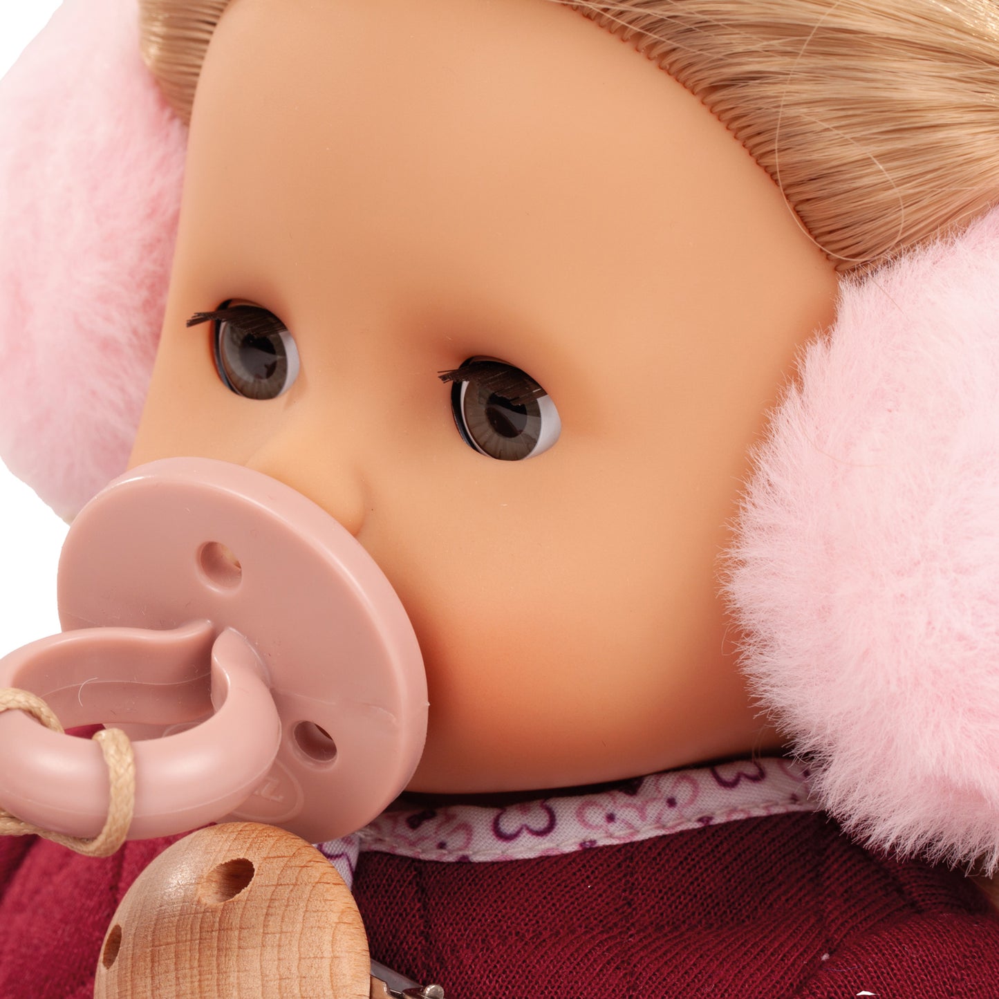 Jubilee Muffin Doll 13 inch soft doll with brown hair, pink pacifier and fuzzy pink ears