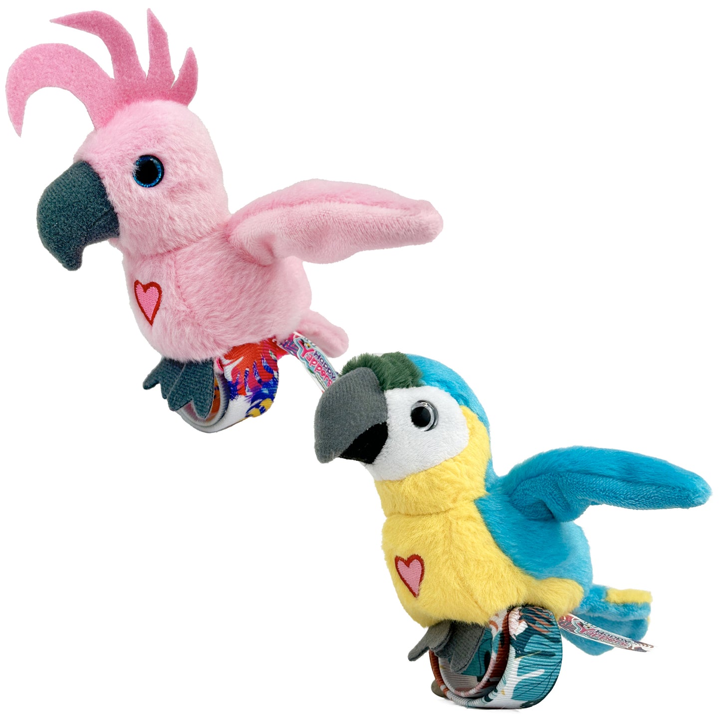 Two plush interactive birds: pink cockatoo with crest and gray-and-yellow-blue parrot, each with heart detail on chest and fabric wing bands