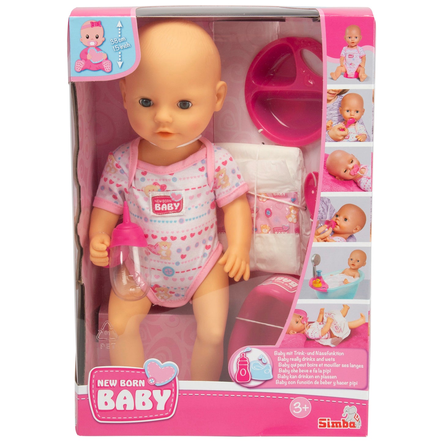 New Born Baby 15-inch doll with pink heart onesie, includes bottle, diaper, and accessories in packaging