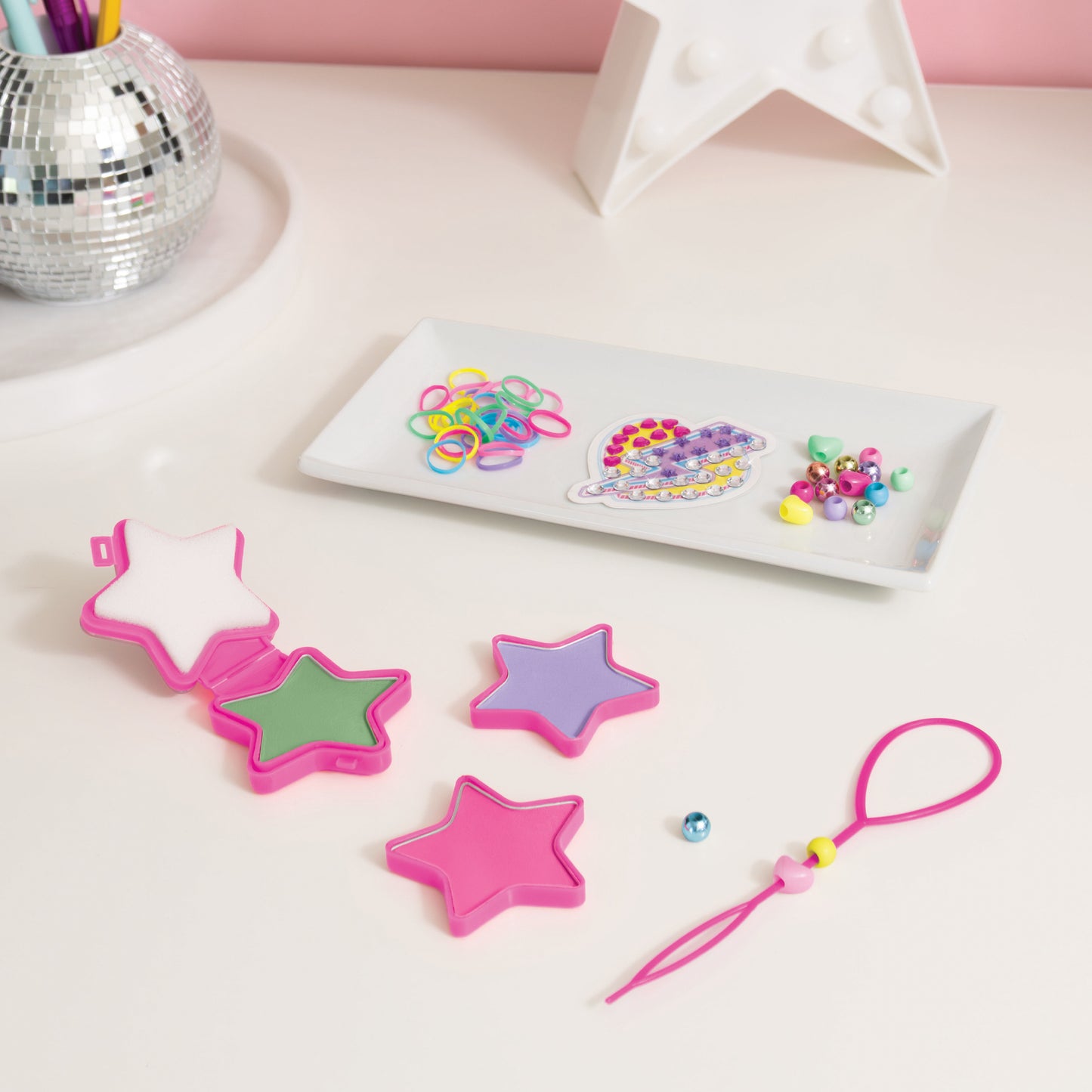 Hair Styling Set: Star Power with pink star clips, hair ties, and colorful beads