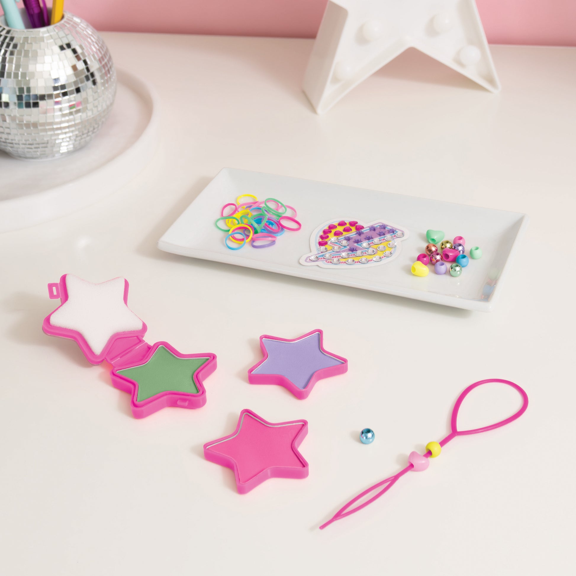 Hair Styling Set: Star Power with pink star clips, hair ties, and colorful beads
