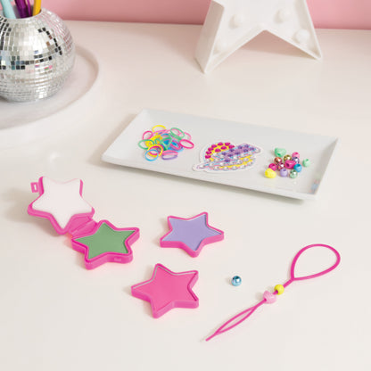 Hair Styling Set: Star Power with pink star clips, hair ties, and colorful beads
