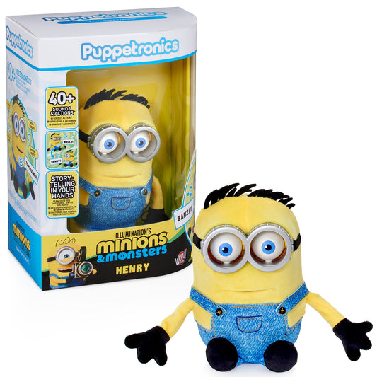 Puppetronics Henry Minion toy with yellow body, blue overalls, large round eyes, and black spiky hair, shown with pac...