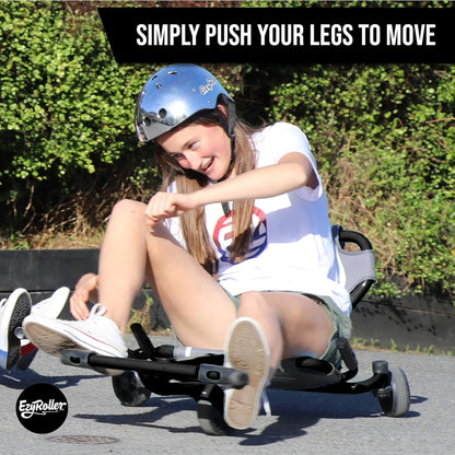 EzyRoller Drifter Pro X Black Magic ride-on toy with child