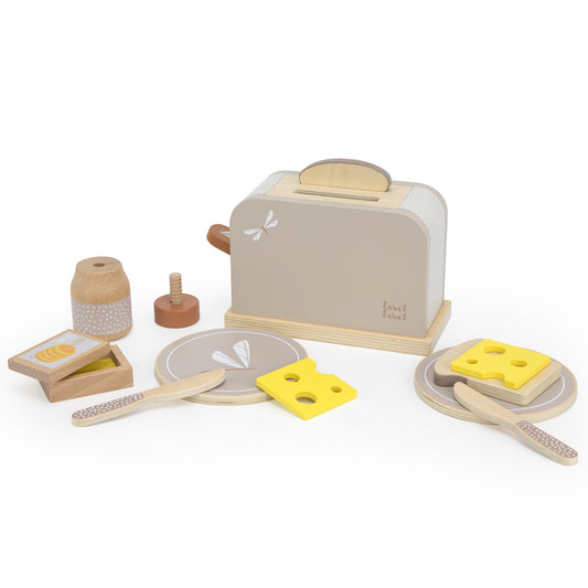 Wooden toaster set with tan and cream toaster, yellow cheese slices, wooden plates, utensils, butter dish, and salt shaker