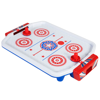 Tabletop air hockey game with red and blue frame, white playing surface with red and blue star design, two red pusher handles, and red dome pucks