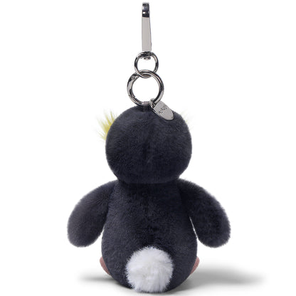McHugs Macaroni Penguin Bag Charm Plush with black body, white belly, and yellow head tuft, attached to silver keycha...