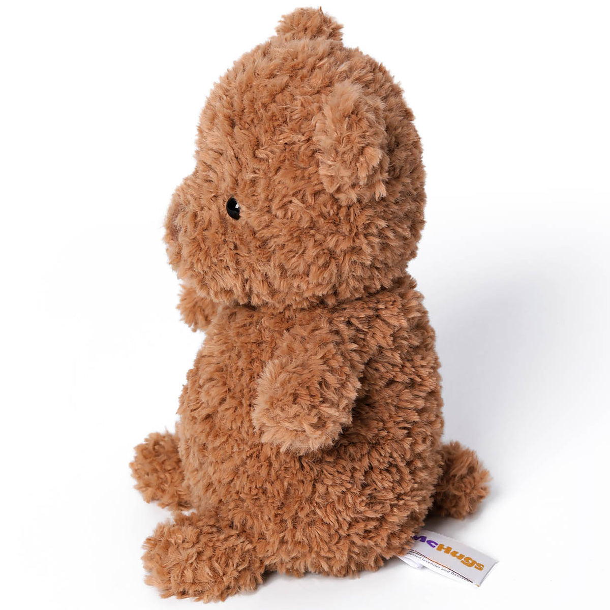 McHugs Swiss Roll Bear 7-inch plush toy in tan brown, sitting upright with a friendly expression