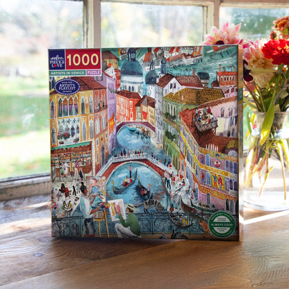 Piece&Love Artists in Venice 1000 piece puzzle box featuring colorful illustrated Venetian canals and gondolas