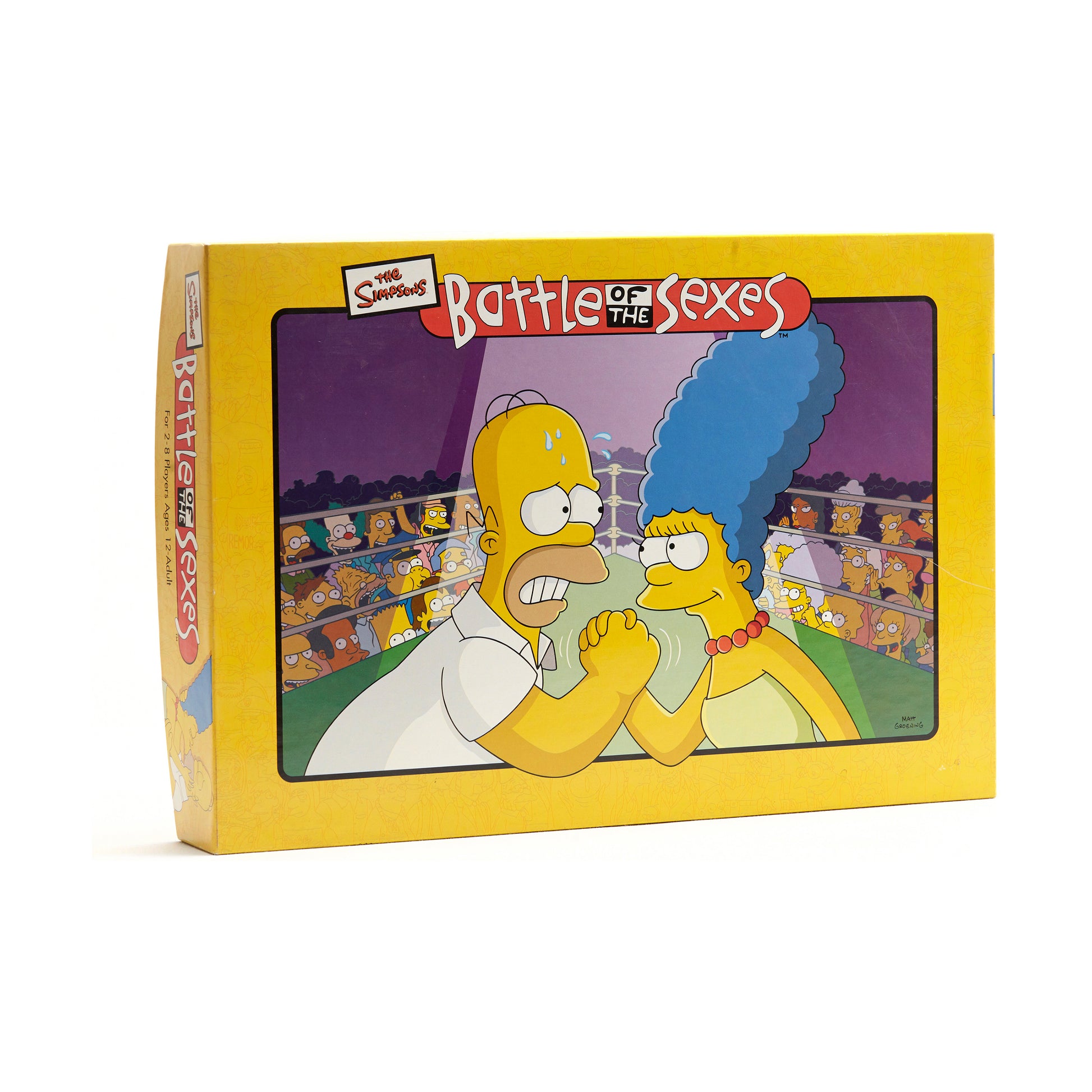 The Simpsons Battle of the Sexes board game box with yellow packaging featuring Homer and Marge Simpson in a stadium setting