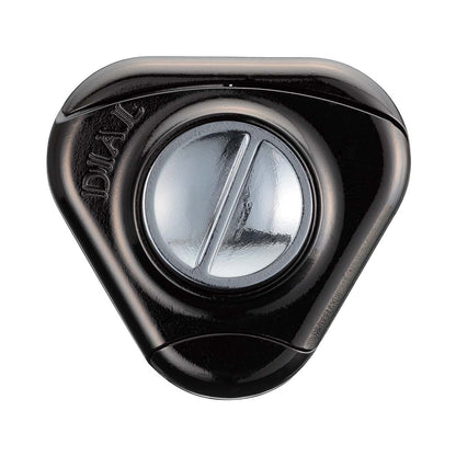 Black cast metal puzzle with rotating dial and clear center window, viewed from above