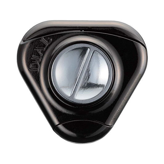 Black cast metal puzzle with rotating dial and clear center window, viewed from above