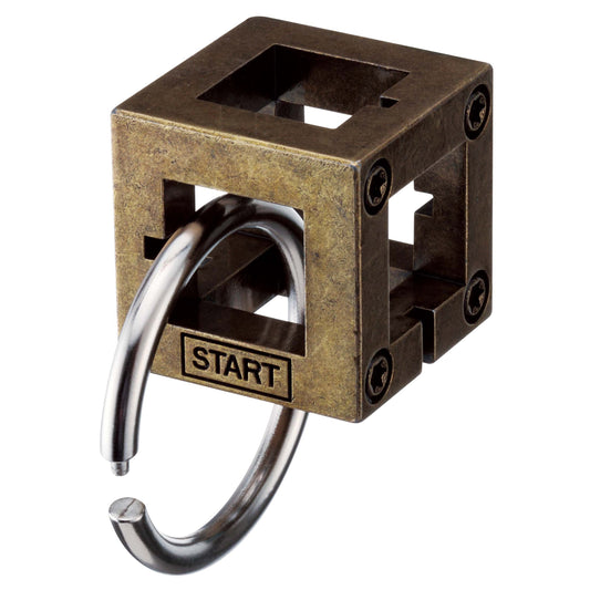 Brass metal puzzle cube with START label and silver hook lever attached