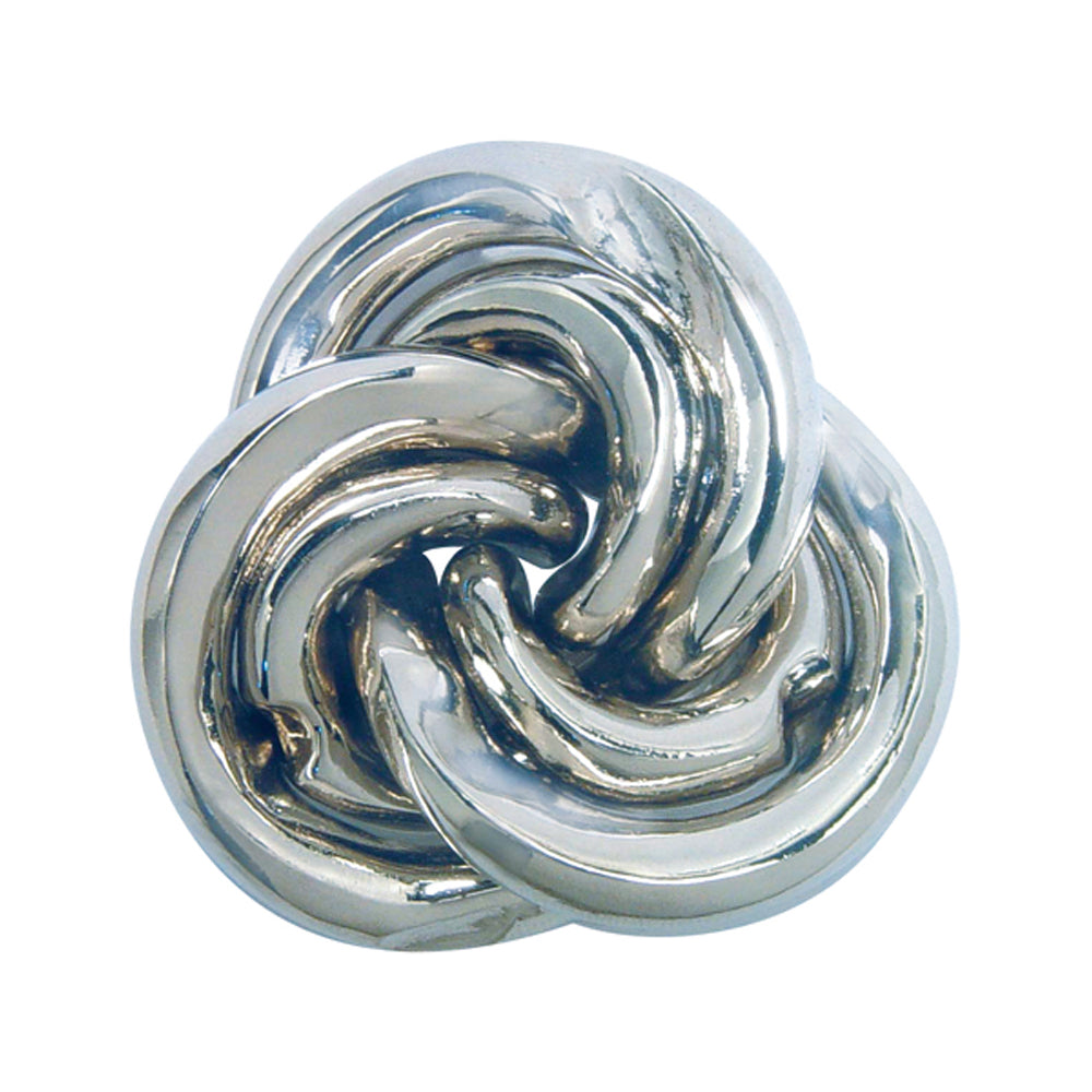 Silver metal puzzle with interlocking curved pieces forming a swirling, abstract shape