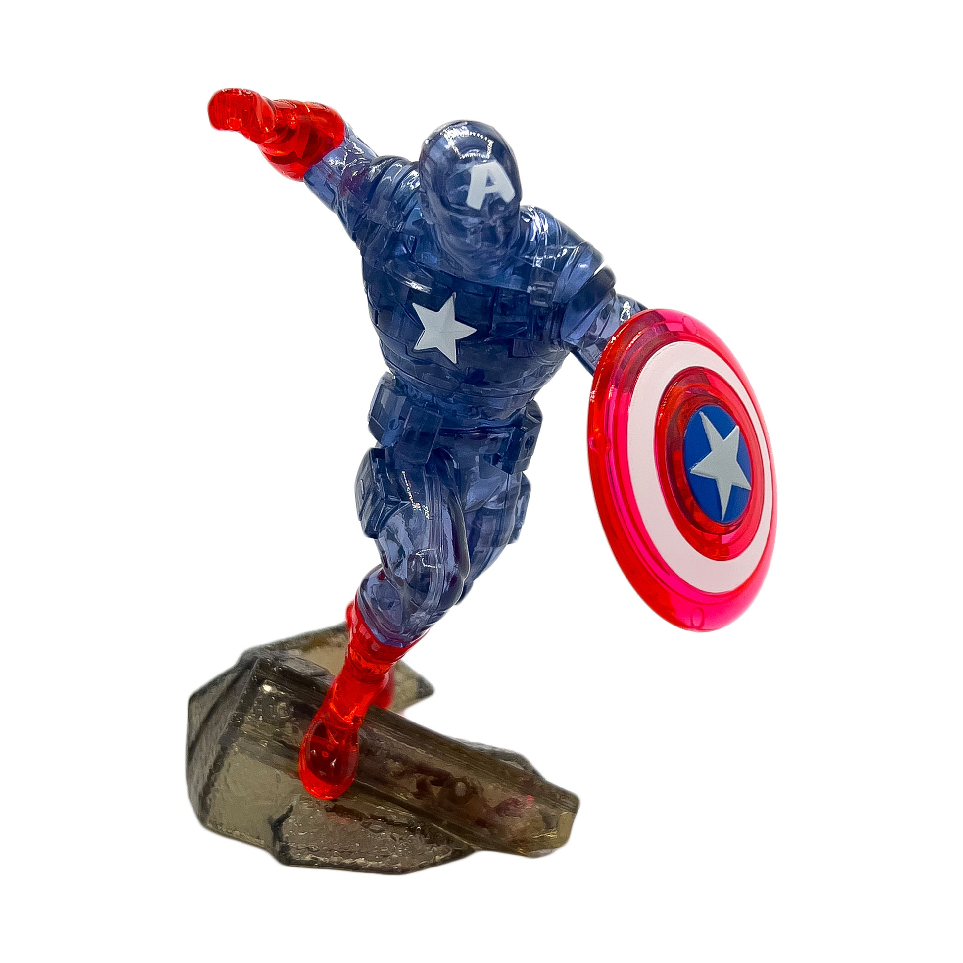 Captain America action figure in blue suit and red boots holding red and white shield, standing on rock base