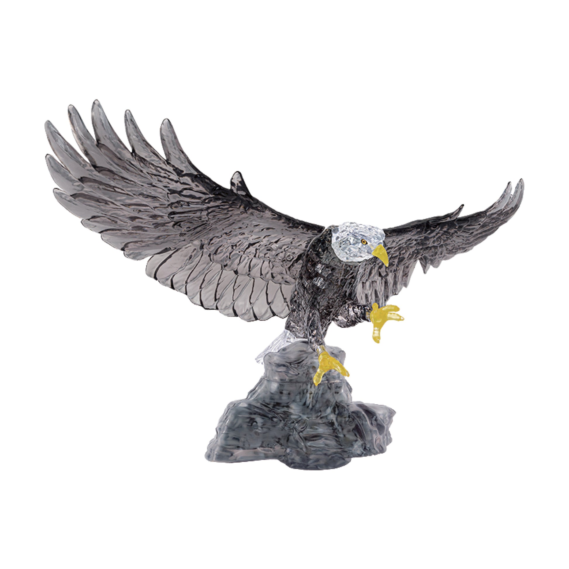 Bald eagle figurine with white head, black body and wings, yellow beak and talons, mounted on gray rocky base