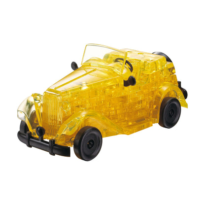 Yellow transparent 3D crystal puzzle car with black wheels and windshield, assembled form