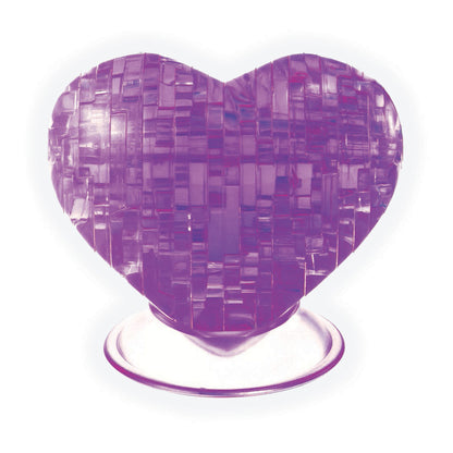 Purple translucent 3D crystal puzzle shaped like a heart with geometric cutout pattern, assembled on white stand