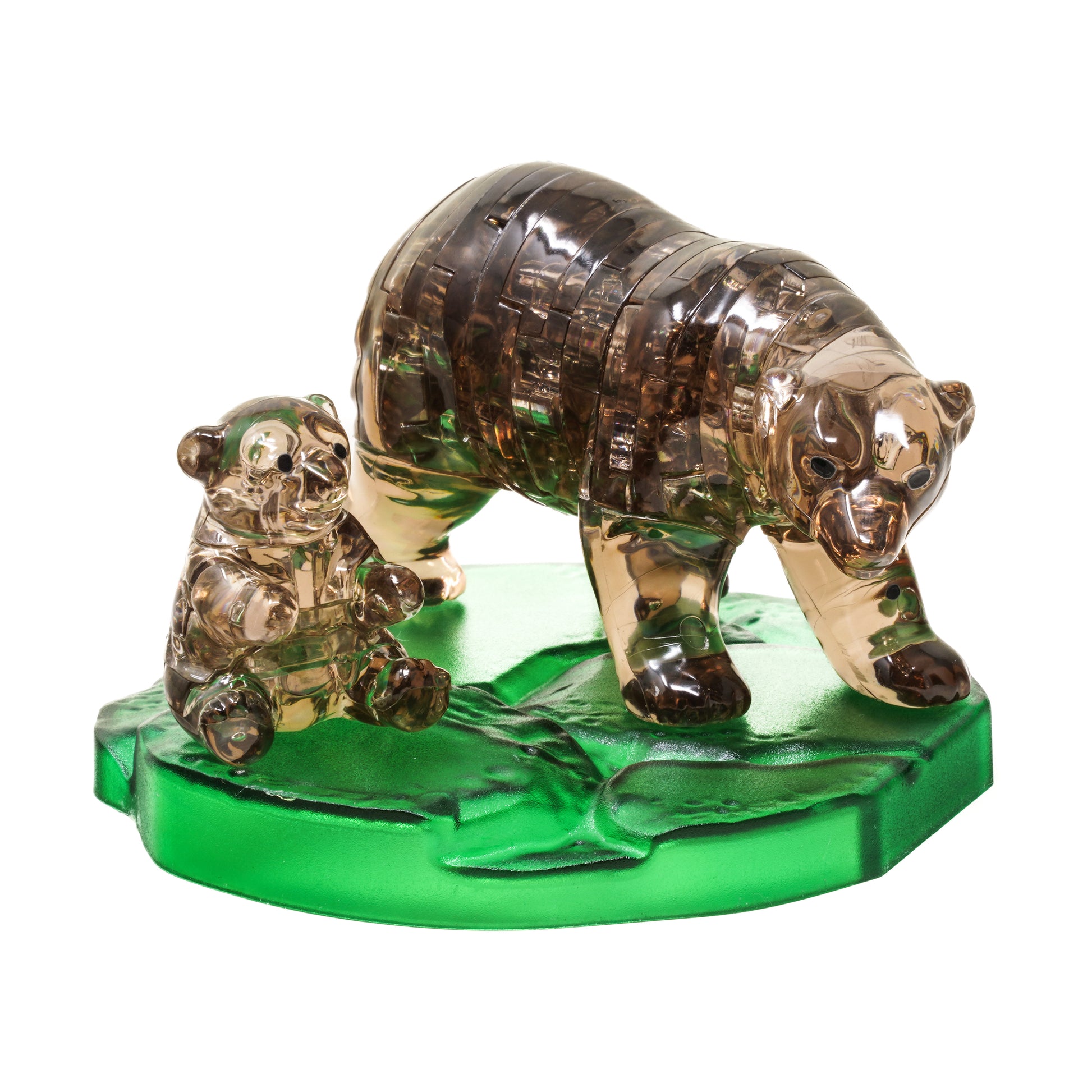 3D crystal puzzle featuring translucent brown bear and cub figurines on green base with leaf details