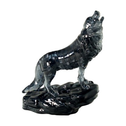 Black crystal wolf figurine with segmented body standing on black rocky base, head raised and howling