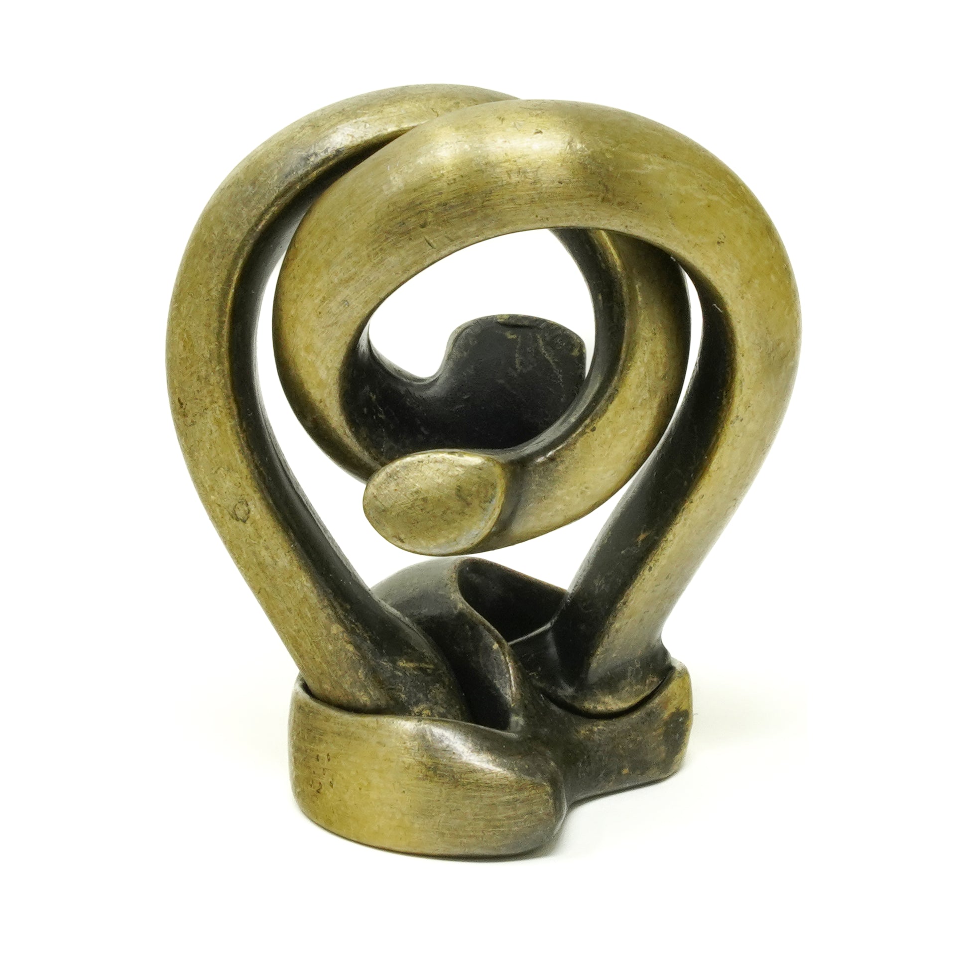 Brass cast metal puzzle with interlocking curved and geometric shapes, featuring movable spherical and angular components