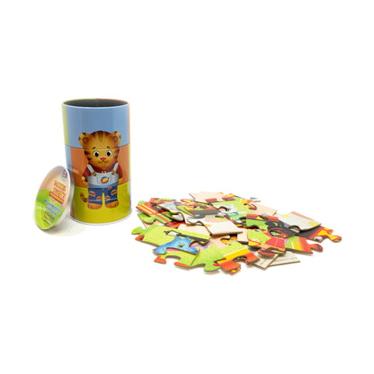 Daniel Tiger's Neighborhood 24 pc Mix and Match Tin Puzzle with colorful puzzle pieces and storage container