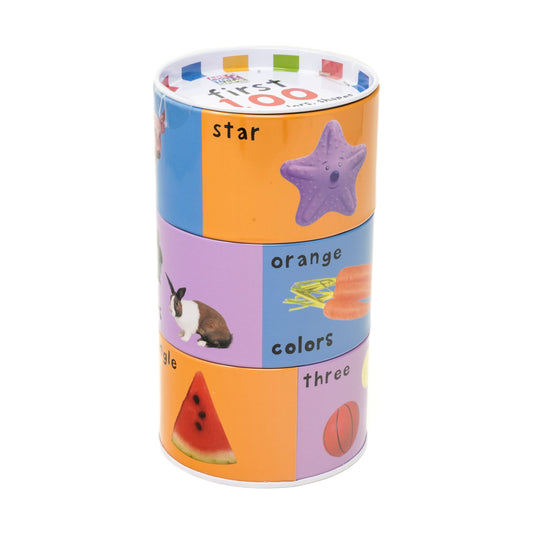 First 100 Puzzle Tin featuring colorful panels with purple star, orange carrot, rabbit, watermelon, and basketball, teaching numbers, colors, and shapes