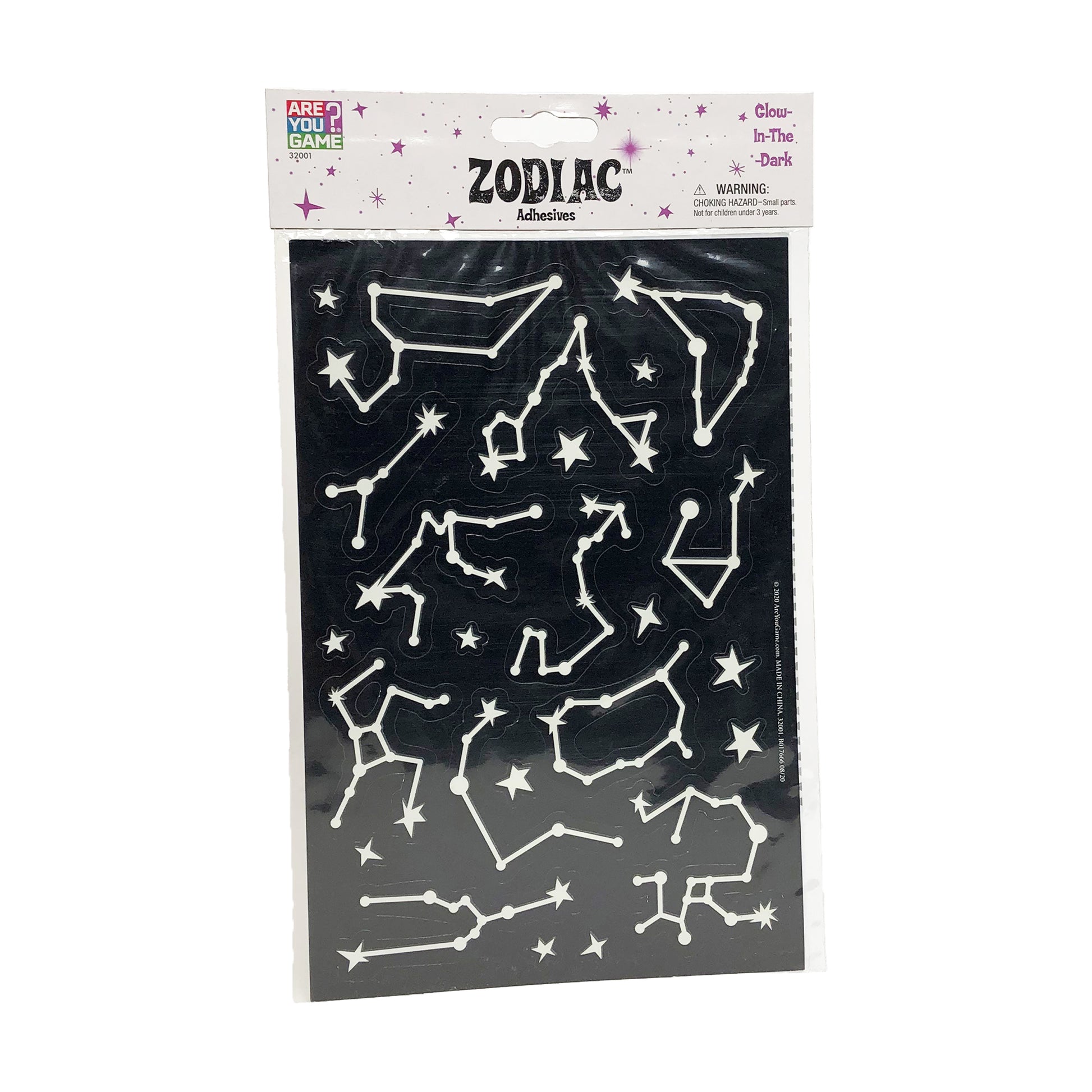 Glow-in-the-dark zodiac adhesive shapes set featuring white constellation outlines and stars on black background, packaged in labeled header card