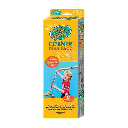 Paper Trax Corner Trax Pack box showing child modeled holding cardboard track piece with toy car, yellow and blue packaging, ages 3+