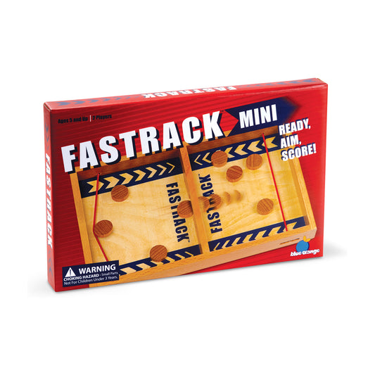 Fastrack Mini board game box with red packaging, wooden game board with brown pegs and black chevron details, tagline 'Ready, Aim, Score'