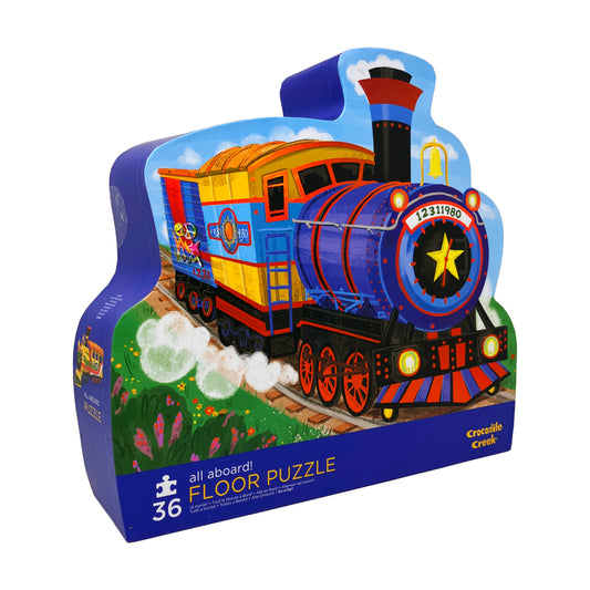 All Aboard! 36-piece floor puzzle featuring a colorful blue, red, and yellow steam train with smoke stack and yellow star on engine, set against green landscape