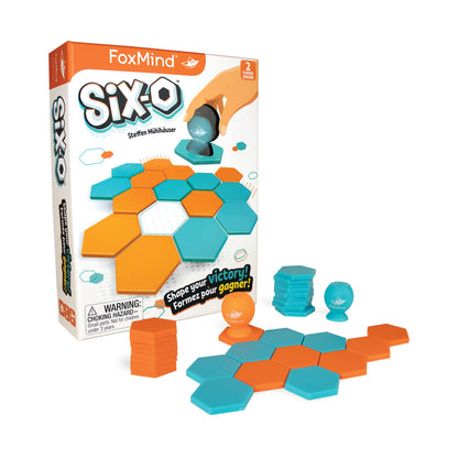 FoxMind SIX-O hexagon puzzle game with turquoise and orange pieces and game pusher